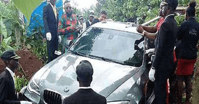 SON BURIES FATHER IN bmw